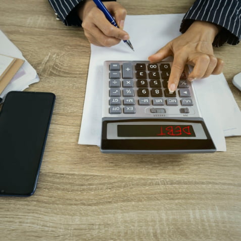 A man signing an agreement